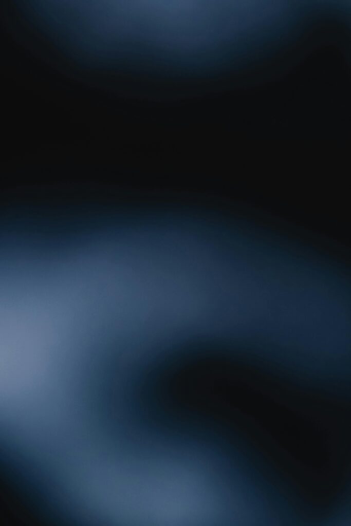 DAY 56 - NOT CONSULTING GOD? Blurry abstract texture with deep blue and black tones, perfect for modern wallpapers.