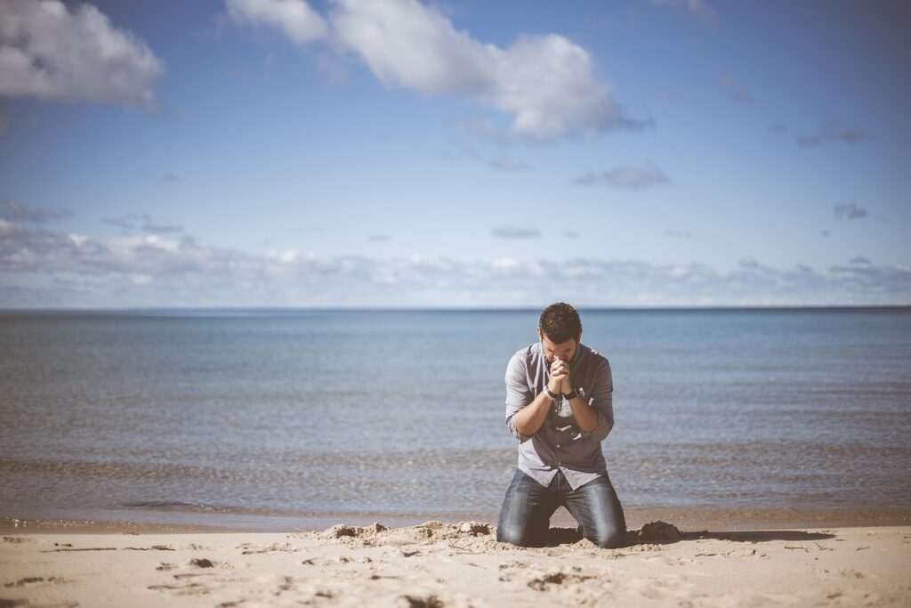 beach, idyllic, man, ocean, peaceful, person, praying, sand, sea, seashore, seaside, shadow, sky, water, kneeling, begging, blue sky, blue beach, blue water, blue sea, blue ocean, nature, blue pray, blue peace, blue sand