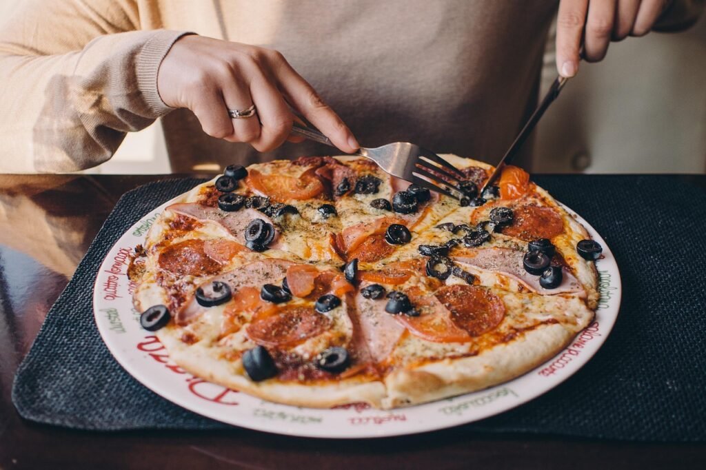 pizza, food, cheese, crust, pepperoni, olives, fork, knife, cutting, eating, brown pizza, pizza, pizza, pizza, pizza, pizza